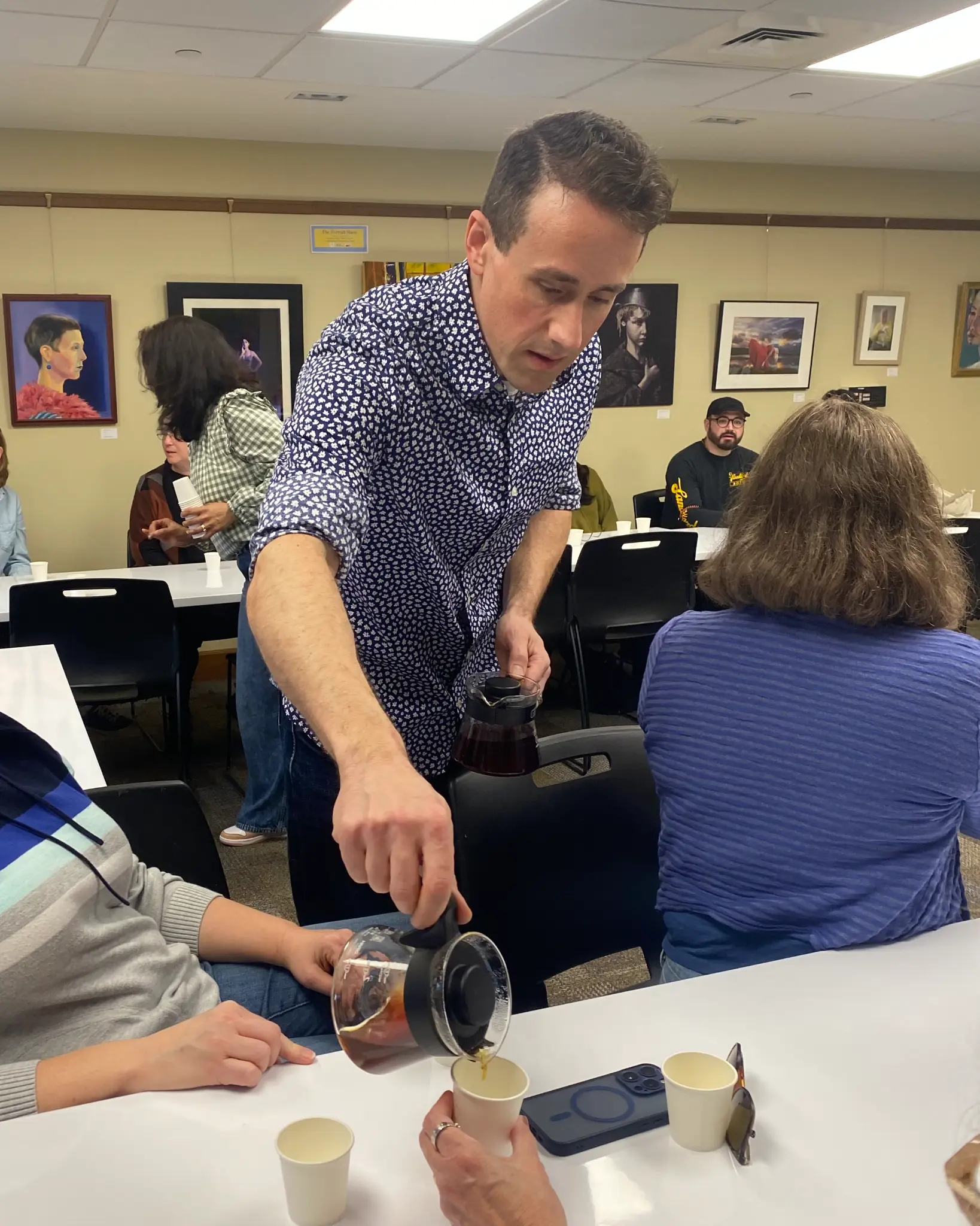 Ike pouring at a tasting
